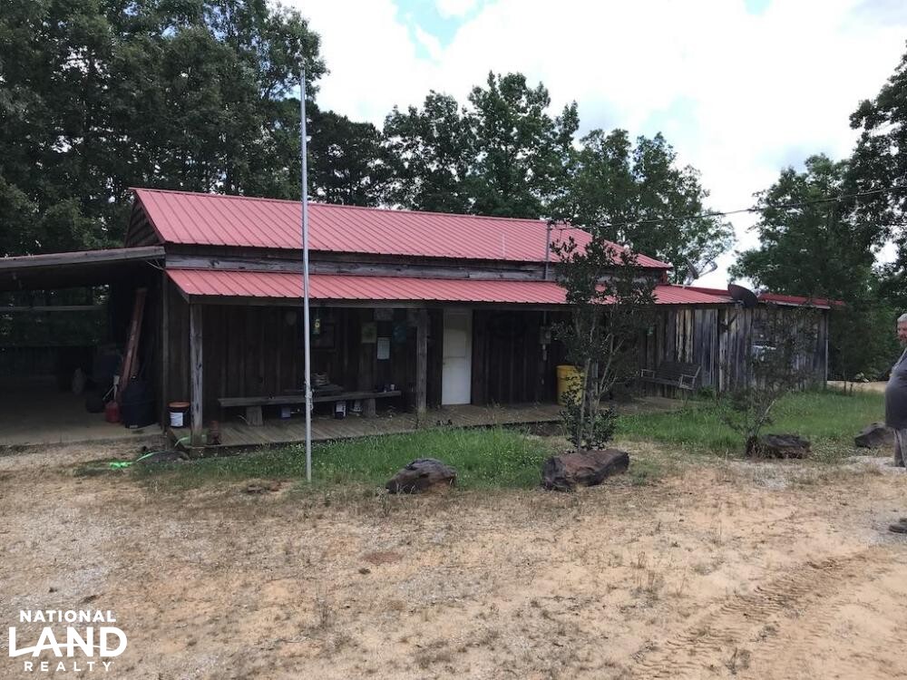 Custom Cabin, Stocked Pond, Huge Food Plot & More in Kemper County