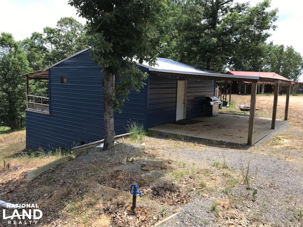 Custom Cabin, Stocked Pond, Huge Food Plot & More in Kemper County