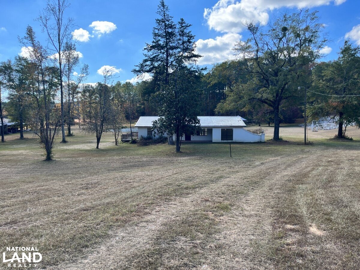 Starter Home/Investment Property With Small Pond Just North of