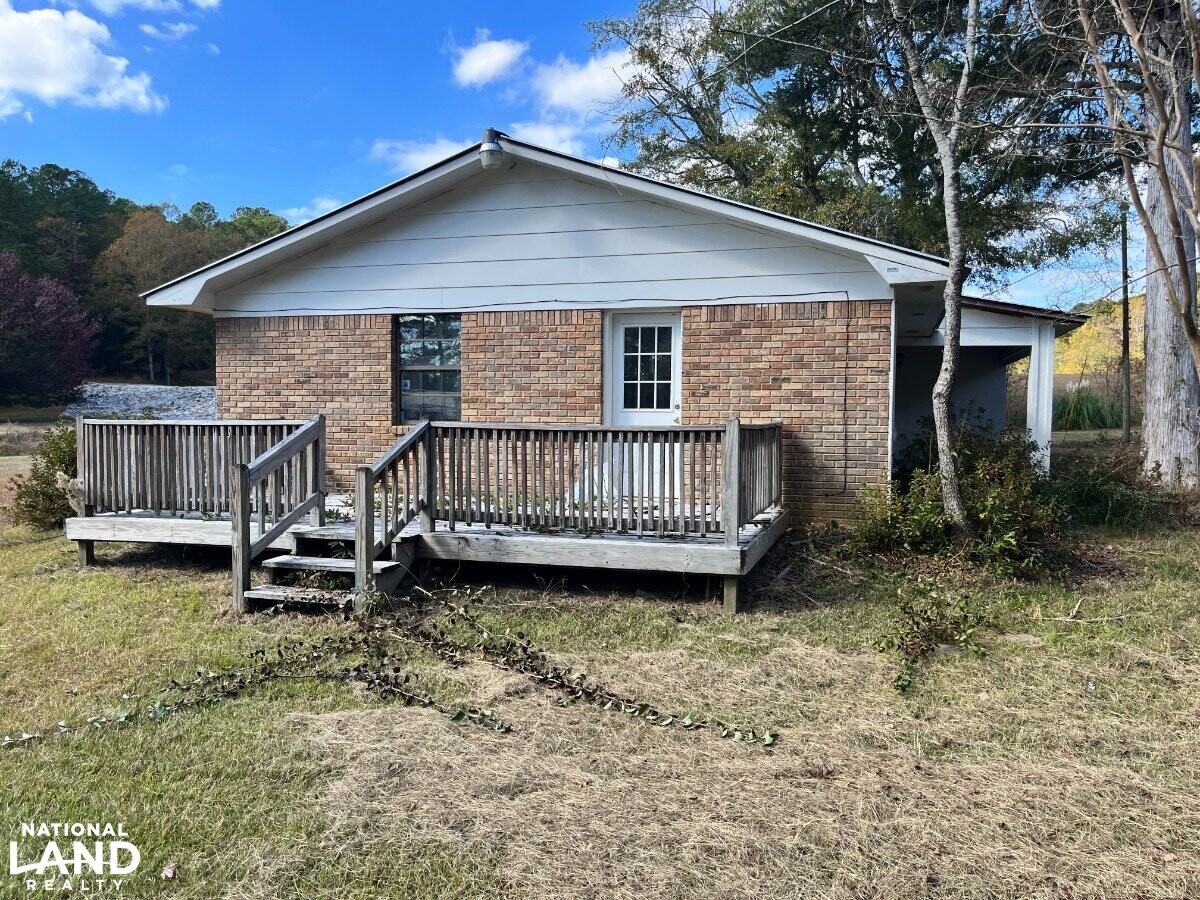 Starter Home/Investment Property With Small Pond Just North of