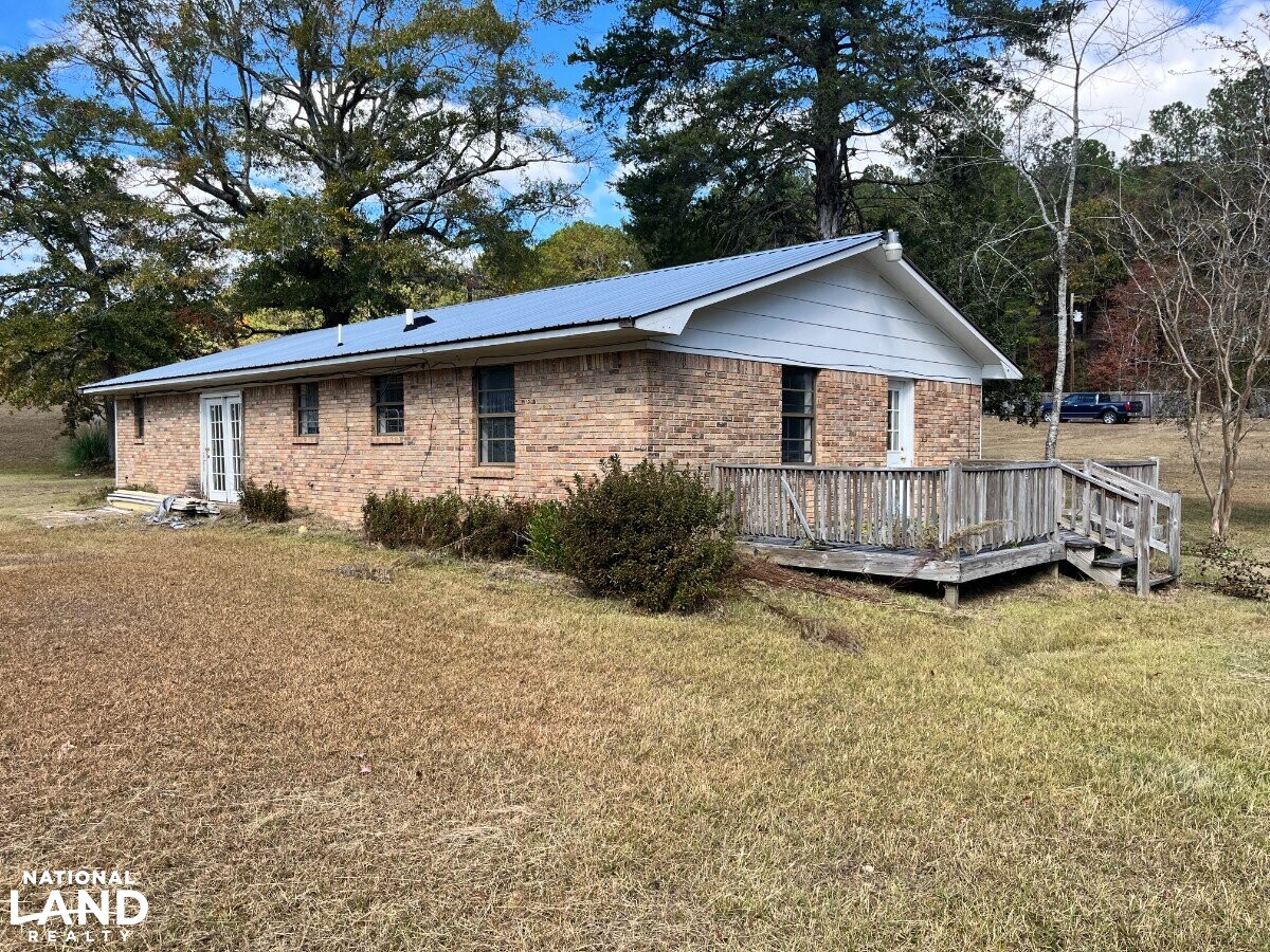 Starter Home/Investment Property With Small Pond Just North of
