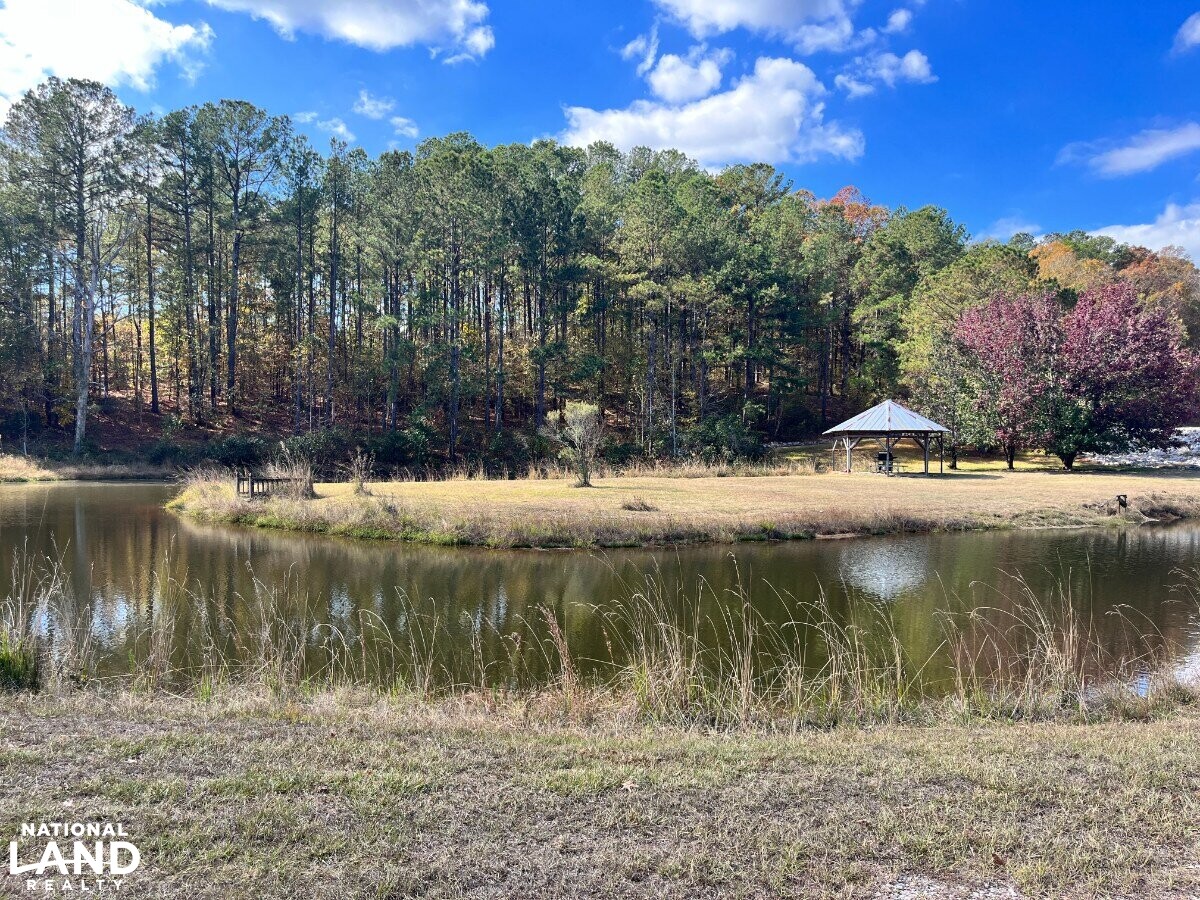 Starter Home/Investment Property With Small Pond Just North of