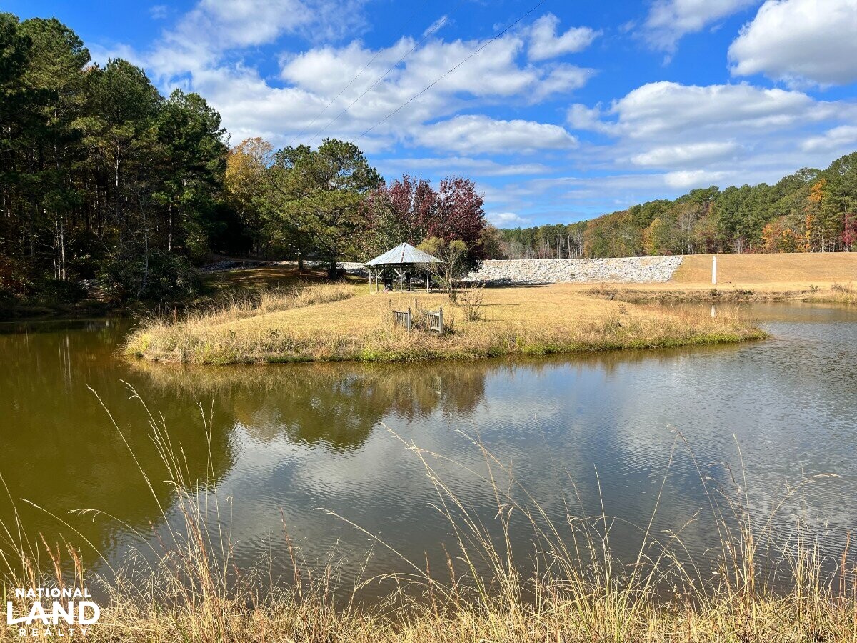 Starter Home/Investment Property With Small Pond Just North of