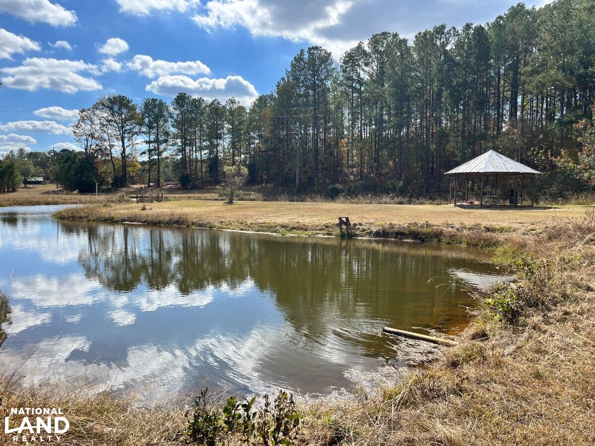 Starter Home/Investment Property With Small Pond Just North of