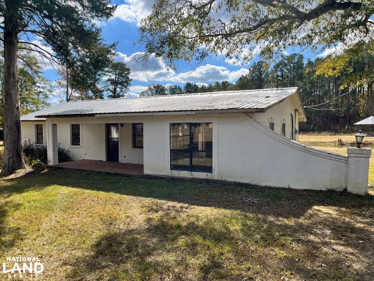 Starter Home/Investment Property With Small Pond Just North of