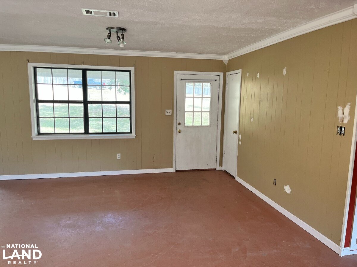 Starter Home/Investment Property With Small Pond Just North of