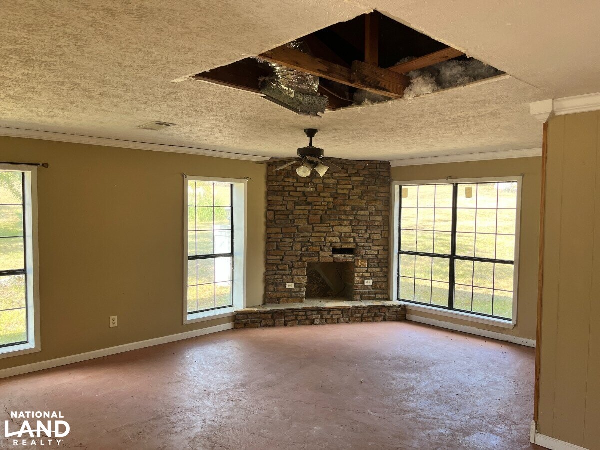 Starter Home/Investment Property With Small Pond Just North of