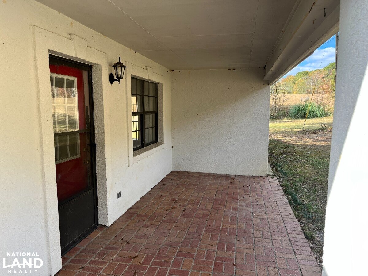 Starter Home/Investment Property With Small Pond Just North of