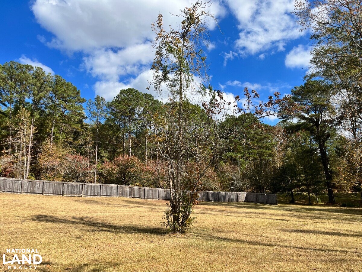 Starter Home/Investment Property With Small Pond Just North of