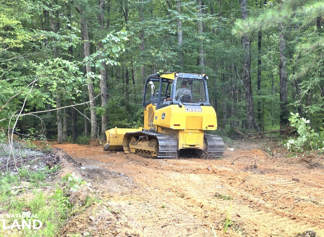 Doing some touch up on the driveway up. (16 of 22)