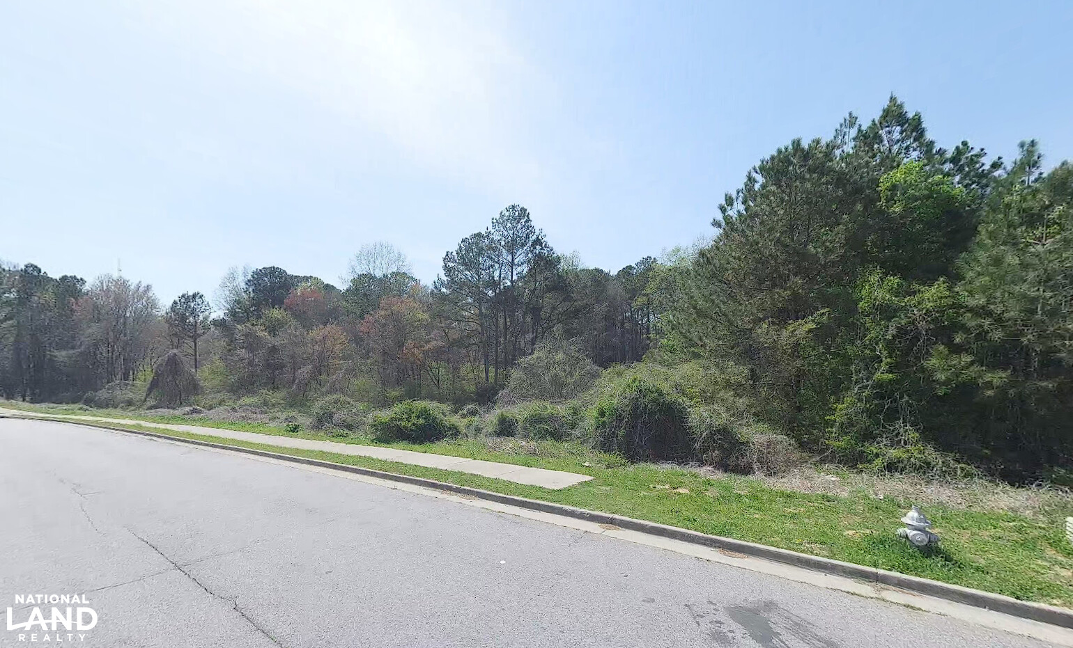 Established infrastructure along properties frontage on Three Lakes Drive. (5 of 6)
